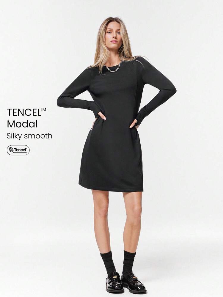 Robe midi en modal avec poches invisibles sur les côtés et pouce intégré, décontractée pour un usage quotidien