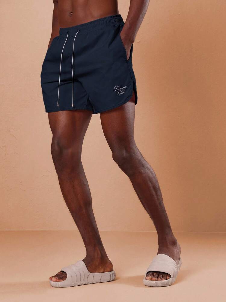 Regular Fit Curved Hem Drawstring Shorts With Side Pockets