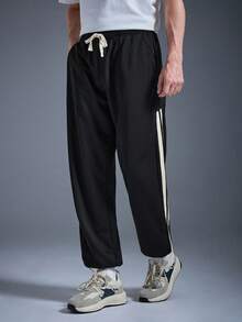 DRIFTMERE 休闲宽松运动裤，后袋设计，侧缝撞色条纹，舒适罗纹裤脚，春夏运动裤 - 黑色 - 查看 6