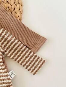 SHEIN 新生女宝宝可爱休闲针织弹力长袖连体衣，卡通印花，搭配裤子和帽子，秋冬季