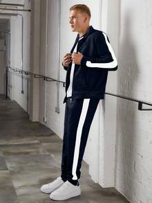 Completo casual da uomo con colletto alla coreana, strisce laterali e colori a contrasto, versatile in due pezzi