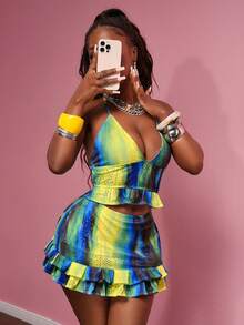 Slaydiva 2025 Spring/Summer New Bohemian Music Festival Country Western Vacation Avant-Garde Y2K Sexy Bombshell Blue & Green Tie-Dye Tie Dye Print Hollow Mesh Textured Semi-Sheer Elastic Jacquard Knit Fabric Deep V Halter Backless Crop Top With Elastic Waist Double Ruffle Hem Mini Skirt Set