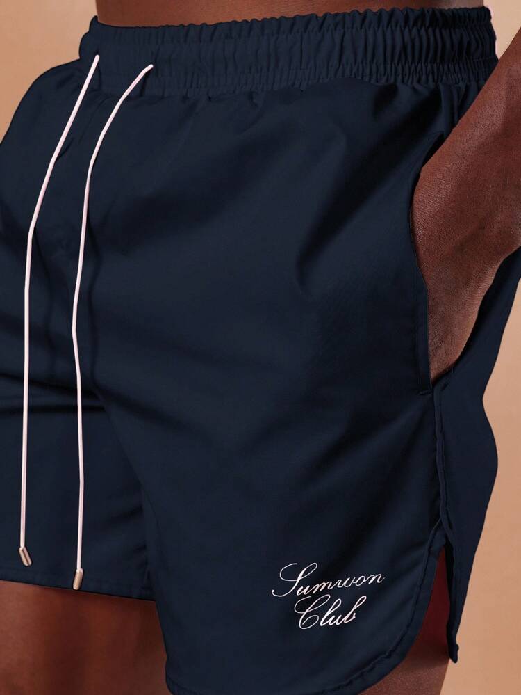 Regular Fit Curved Hem Drawstring Shorts With Side Pockets