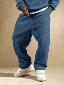 SUMWON 男士运动裤，黑色宽松版型 | 街头风 | INS 必备 | 休闲舒适 | 假日必备单品，这款黑色宽松版型运动裤采用优质面料制成，舒适透气，可轻松搭配任何运动或休闲服饰。简约设计使其成为各种场合的理想之选。 - 水鴨藍 - 查看 5