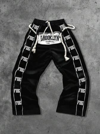 Street Life Pantalones de chándal para hombres con bordado aplicado, cordón, estilo urbano con estampado en inglés americano