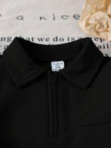 SHEIN 男/女宝宝休闲装，温暖舒适的穿着，适合温和天气。纯色半拉链领长袖上衣，套头设计，方便穿着；搭配纯色无腰带裤。适合户外漫步、居家休闲、轻度运动或温馨的家庭聚会，让宝宝展现天真活力，成为关注的焦点。 - 黑色 - 查看 5