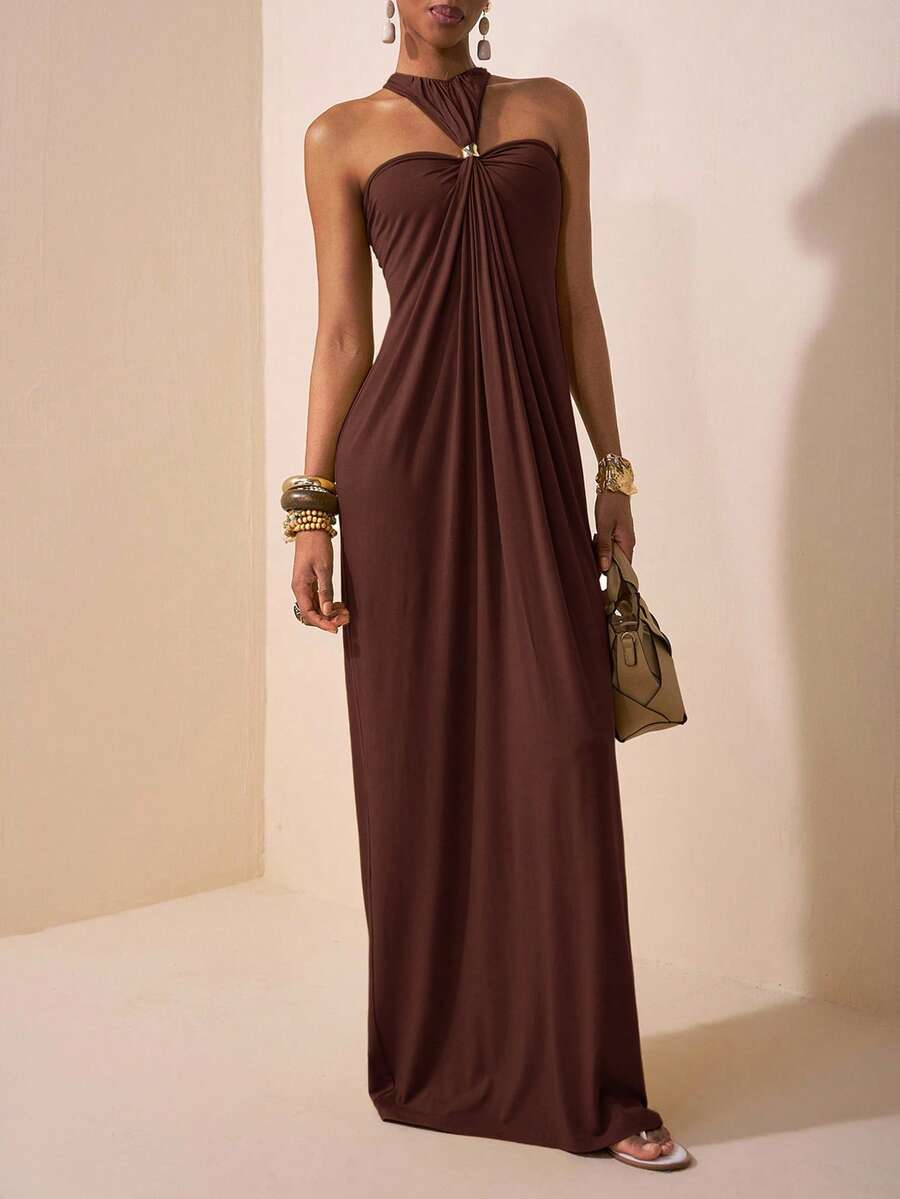 Zivah Lễ hội âm nhạc Xuân/Hè 2025 mới đến, Lễ Phục sinh, Ngày Thánh Patrick, Phong cách miền Tây, Du mục, Tiệc sinh nhật, Lễ tốt nghiệp, Phong cách đại học, Sinh viên, Thường ngày, Cơ bản, Giải trí, Kỳ nghỉ, Du lịch du thuyền, Bãi biển, Tắm nắng, Lan truyền, Thời trang đường phố, Khách dự tiệc cưới Boho, Đi làm, Ăn trưa, Sân bay, Váy dài hở lưng màu xanh lá cây có vòng kim loại trang trí