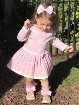 SHEIN Playful Pals Baby Girls' Casual Fashion Cute Pink Bow Pleated Knit Dress, Soft & Comfortable, Suitable For Daily, Outing, Travel, Holiday, Home, Nursery, Autumn/Winter, Christmas, Back To School, Party, Versatile Fall