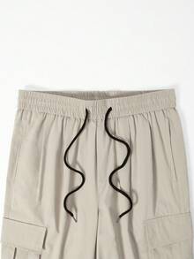 Manfinity Roghcode 秋季宽松男士翻盖口袋侧抽绳腰工装裤