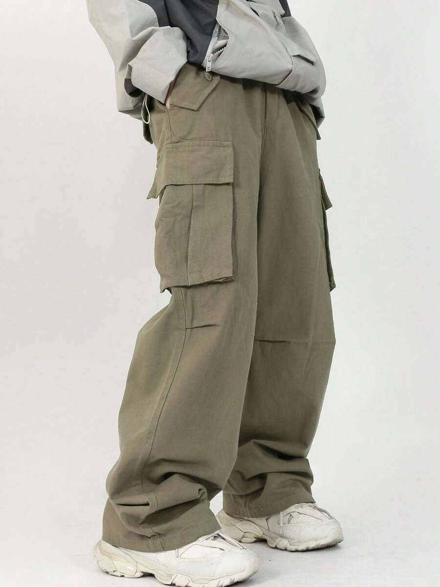 Manfinity Roghcode Pantalones cargo holgados para hombre con bolsillo con solapa y cordón ajustable en la cintura, para otoño - Verde militar - Ver 1