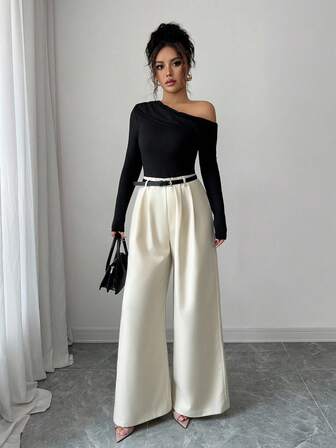 Rafferiza Mono elegante de mujer con hombros descubiertos y contraste de color para uso diario