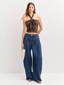 Nöista 这款黑白条纹露背上衣配有领带和黑色滚边，将复古 Y2K 美学与街头潮流融为一体，非常适合秋季、冬季、返校季和老派风格的女性。 - 鏽棕色 - 查看 5