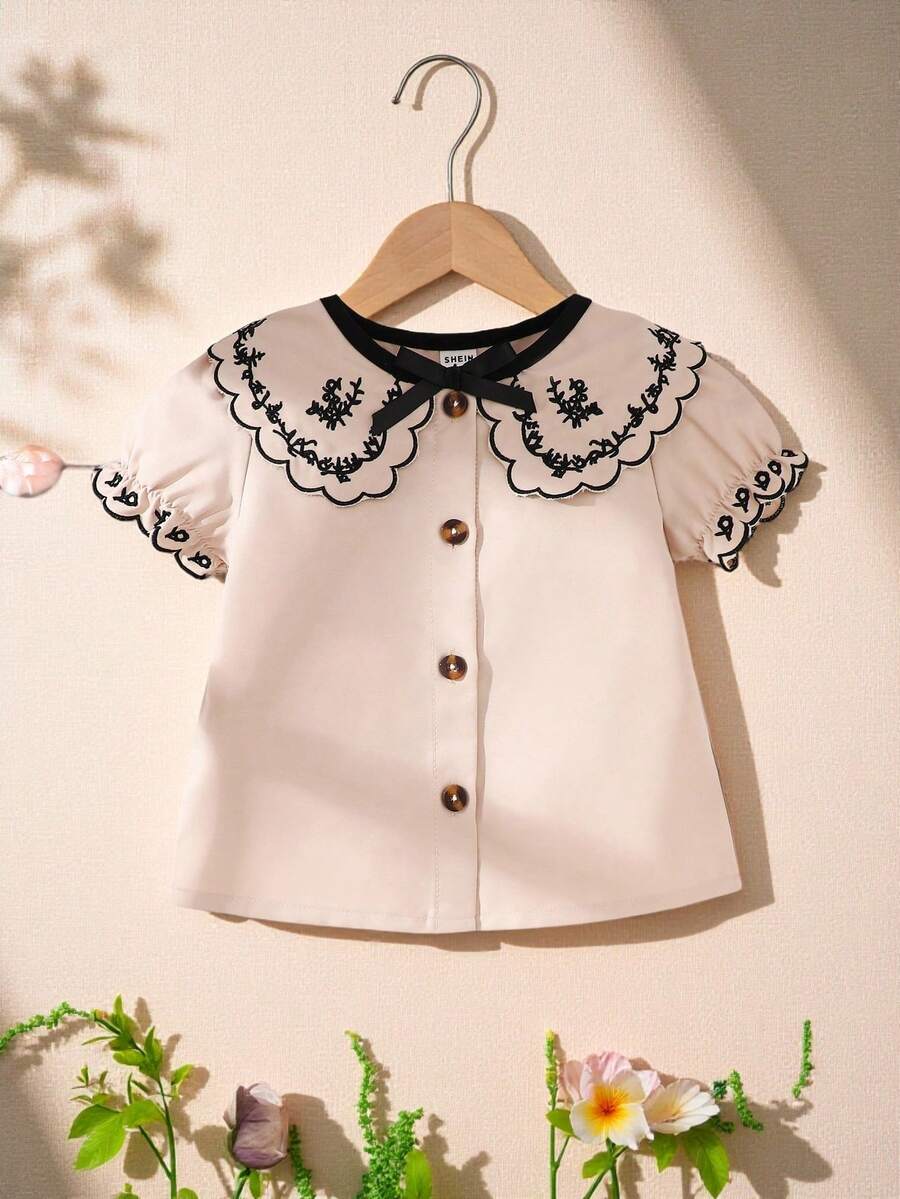 Souflis Souflis 女婴杏色柔软短袖休闲衬衫，前开口，刺绣衣领和袖口，蝴蝶结领子，休闲风格夏季