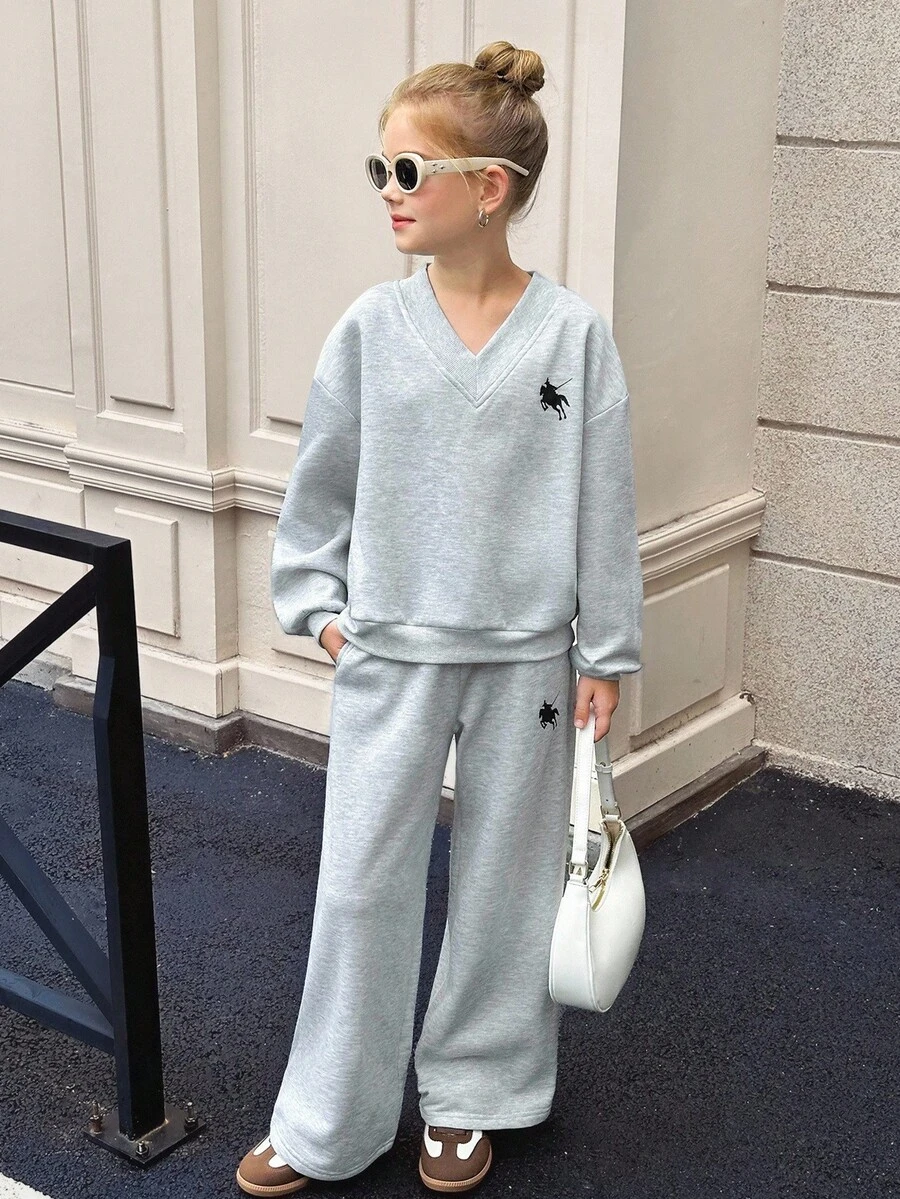 SHEIN Tween Girls Solid Light Gray Fleece Inner Oversize V-Neck Fluffy Loose Fit Long Sleeve Sweatshirt With Print And Wide Leg Sweatpants, Small Logo Print, Sweatshirt And Sweatpants Set For Autumn/Winter, Tween Girl Sweatshirt Pants Set Girl Two Piece Long Sleeve Set Tween Matching Set Teen Girls 2 Piece Pants Set Casual Two Piece Set Grey Sweatpants Set V-Neck Sweat Suit Sweatshirt Straight Pants Suit Tween Girl Teen Two Piece Long Sleeve Set - Light Grey - View 1