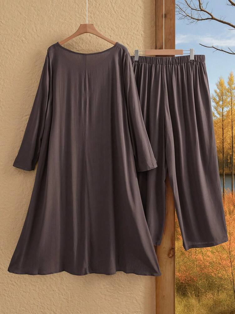 Plus Size Women's Fall Solid Color Round Neck Long Sleeve Asymmetric Hem Top And Wide Leg Pants Loose 2-Piece Set
