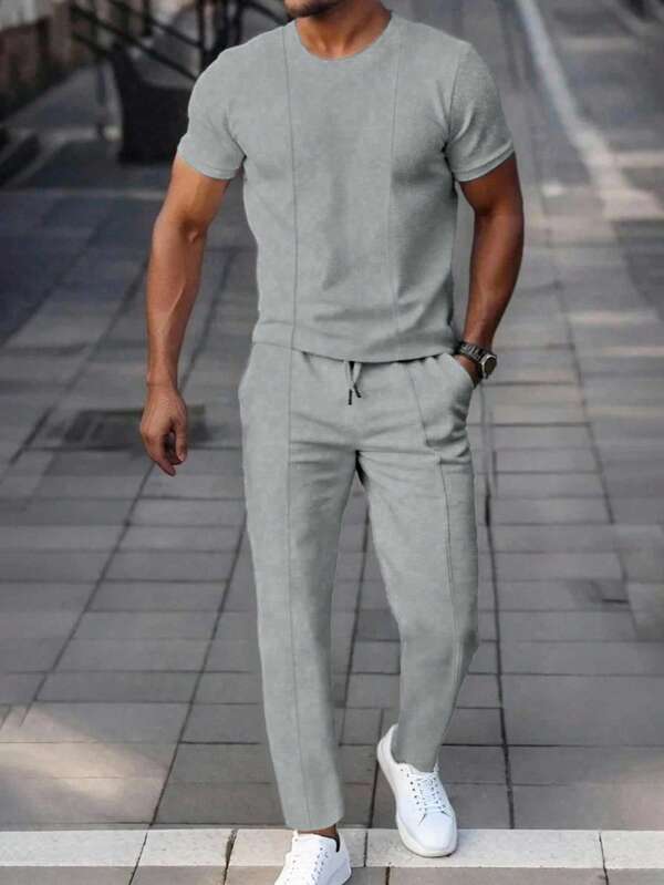 Manfinity Homme Conjunto de pantalón y parte superior de manga corta con cuello redondo de unicolor casual para hombres, conjunto de dos piezas para hombre, conjunto de verano para hombre, conjunto casual para hombre, conjunto coordinado para hombre, atuendo gris para hombre, atuendos cómodos