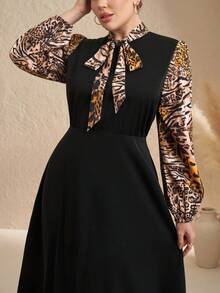 Chikora 加大码黑色拼布豹纹领结蝴蝶结长袖灯笼袖休闲连衣裙，适合日常穿着和通勤 - 彩色 - 查看 1