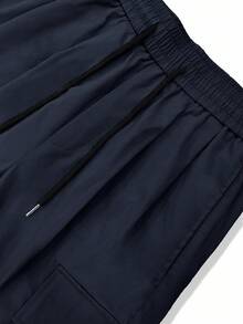 Manfinity Roghcode Pantaloni cargo da uomo con tasche laterali a patta e vita con coulisse, adatti per l'autunno