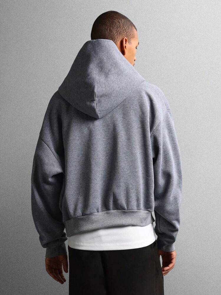 Sudadera con capucha y cremallera completa con bolsillos divididos