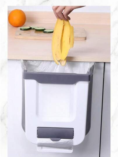 SHEIN 1 pieza Cubo de basura plegable montado en la pared para la cocina, contenedor de almacenamiento colgante para puerta de gabinete, cubo de basura creativo y conveniente, fondo aleatorio.
