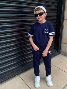 SHEIN 2pcs/Set Tween Boys' Casual Mix Print Crew Neck Short Sleeve T-Shirt And Ribbed Cuff Jogger Pants Set