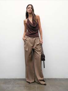 Nöista Brown Halter Top With Draped Cowl Neckline And Metal Ring Detail. Sexy Y2K Going-Out Top Perfect For Parties, Date Nights, Or Chic Summer Looks. Women's Sleeveless Crop-Style Halter Shirt. - Brown - View 6