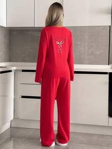 Set pigiama da donna Cottonline con t-shirt a maniche lunghe con scollo tondo, dettagli a fiocco anteriori e posteriori, stampa a contrasto, e pantaloni lunghi tinta unita con fiocco in vita