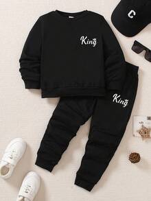 SHEIN Bộ áo thun dài tay cổ tròn in chữ và quần nỉ dệt kim in chữ thời trang xuân/thu/đông cho trẻ em từ 4-7 tuổi, thích hợp mặc hàng ngày, chơi thể thao, đi nghỉ, tiệc tùng, ngày lễ, đi chơi thường ngày, trang phục cơ bản cần thiết - màu đen - Xem 3