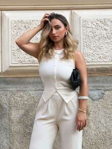 Jeta Ari Conjunto de 2 piezas de moda para mujer, de unicolor y textura, compuesto por un chaleco ajustado sin mangas con cuello redondo y botones, y pantalones rectos de talle alto y corte relajado, estilo elegante para ir al trabajo - Albaricoque - Ver 1