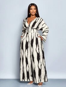 SOLERSUN Bộ đồ liền thân họa tiết sọc thanh lịch cổ chữ V sâu tay cánh dơi màu trắng in họa tiết cho nữ, bộ đồ liền thân ống rộng cạp cao, dáng rộng, thường ngày, bộ đồ liền thân xếp ly eo nhún, thắt eo và thắt eo, trang phục mua sắm hàng ngày phù hợp cho mọi dịp, Halloween - Đen và trắng - Xem 5