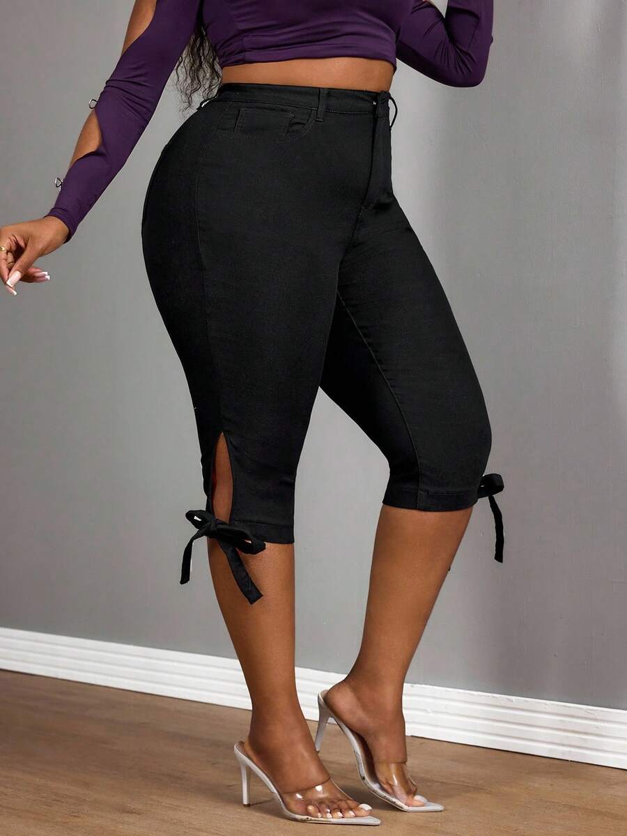 Slaydiva سراويل كابري ضيقة سكسية مع شق الكاحل والفيونكة للنساء ذوات الحجم الكبير باللون الأسود والمطاط - الأسود - مشاهدة 1