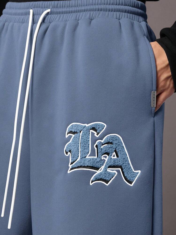 Jogginghose mit tiefem Schritt und LA-Logo-Aufnäher