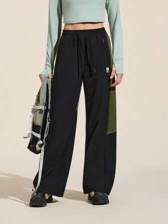 Exploreva بنطلون نسائي رياضي كاجوال بتصميم لوحة ألوان متباينة وسحاب للخارج