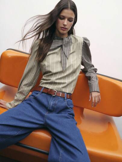 Nöista 双色撞色衬衫，融合条纹和格子，泡泡袖，领口系带设计。复古拼布设计，是秋冬季时尚工作装、复古装扮以及精致外出或派对造型的理想之选。
