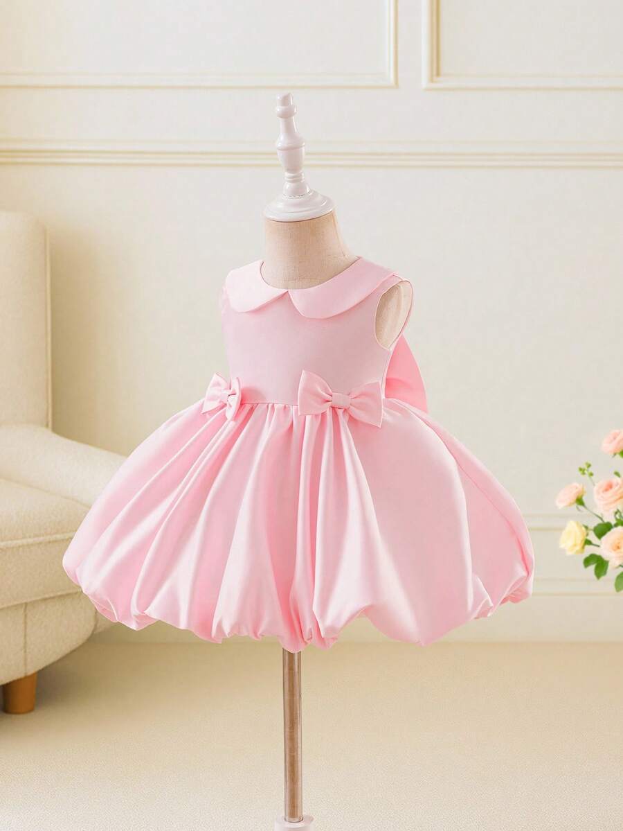 Glamorique Kids Vestido de satén rosa brillante para niña, vestido de niña con cuello Peter Pan, falda de pompones sin mangas con decoración de lazo, vestido de niña de las flores para boda, fiesta de cumpleaños, banquete de otoño e invierno - Rosa - Ver 1