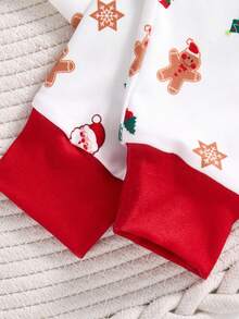 SHEIN Conjunto de pijama de 2 piezas con parte superior con gráfico navideño y pantalón pitillo para niños pequeños, con estampado de renos y copos de nieve, adecuado para Navidad - Rojo y blanco - Ver 5
