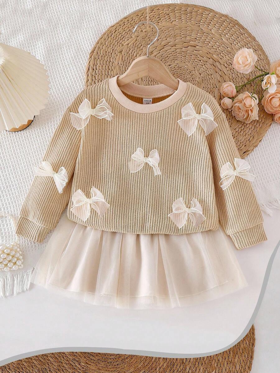 SHEIN ملابس شتوية/خريفية للفتيات الصغيرات مع كنزة صوفية علوية مزينة بفيونكة ثلاثية الأبعاد وتنورة شبكية بلون المشمش، كاجوال وعصرية للخريف - لون مشمشي - مشاهدة 1