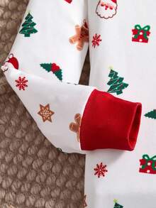 SHEIN Conjunto de pijama de 2 piezas con parte superior con gráfico navideño y pantalón pitillo para niños pequeños, con estampado de renos y copos de nieve, adecuado para Navidad - Rojo y blanco - Ver 3