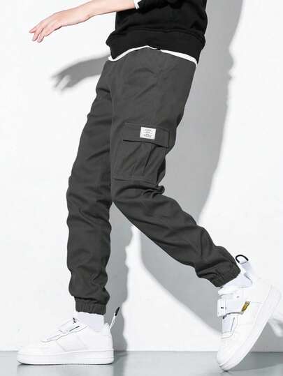 SHEIN Pantalones jogger grises con bolsillo cargo, versátiles para uso diario, escuela, todas las estaciones, para niño preadolescente