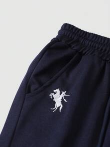 SHEIN Explorewe Calça de moletom casual para meninas (meninas pré-adolescentes), estampa minimalista de logotipo, bolso com decoração em cores contrastantes, calça de moletom de malha, calça comprida larga e relaxada