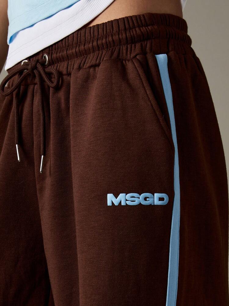 MISSGUIDED Joggers de pierna ancha con rayas laterales