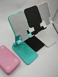 SHEIN 1PC Foldable Desktop Phone Stand - Adjustable Height & Angle, Universal Phone Holder For All Smartphones, Portable Travel & Office Essentials, Non-Slip Silicone Base, Hands-Free Viewing For Video Calls, Streaming, Reading - Space Saving Desk Organizer