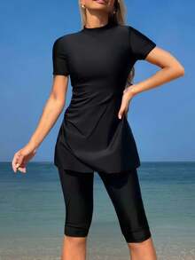 Swim Mulvari 新款女士两件套高领短袖褶皱上衣和百慕大短裤泳衣，夏季中东海滩邮轮度假泳装防晒休闲沙滩保守泳装黑色两件套女士黑色泳衣罩衫布基尼套装女士布基尼泳衣保守 - 黑色 - 查看 1