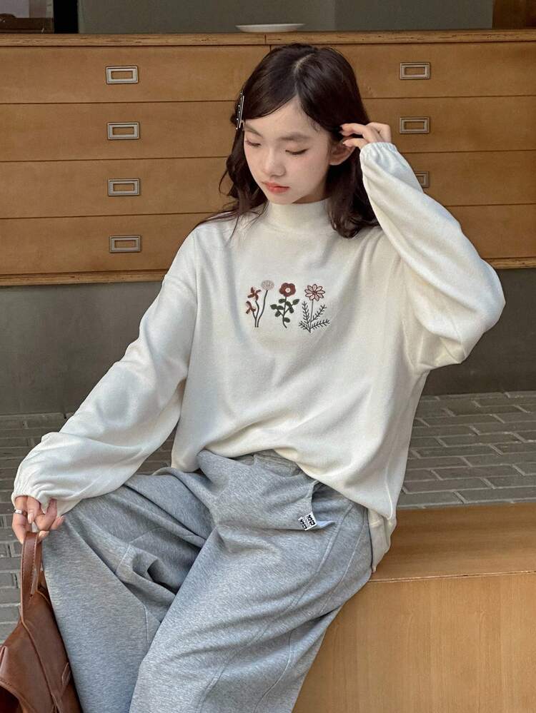 Regular Length Beige Polyester T Shirt For Teen Girls Featuring Funnel Neck Embroidery And Drop Shoulder Long Sleeves