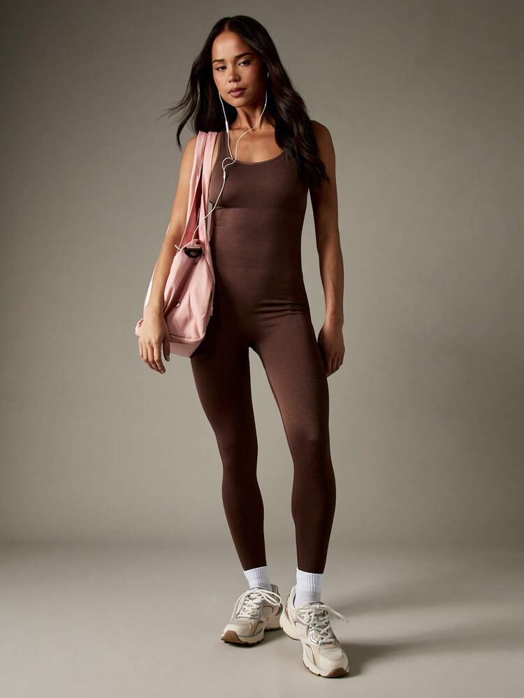 MISSGUIDED Tuta intera con schiena scoperta e canotta incrociata