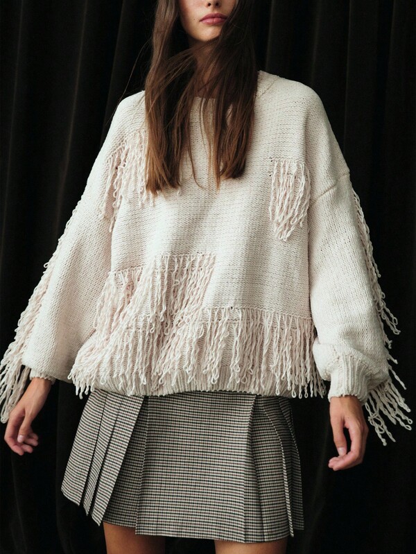 Nöista Chunky Cream Crewneck Sweater With Looped Fringe Detailing Across The Hem, Sleeves And Front Panels, Drop-Shoulder Silhouette And Relaxed Boxy Fit With Ribbed Cuffs And Hem - A Cozy, Statement Layering Piece For Fall, Perfect Over Blouses, Tees Or Dresses For Casual Autumn Outfits, Boho Going-Out Looks, Party Outfits, Graduation Guest Wear Or Smart-Casual Events.