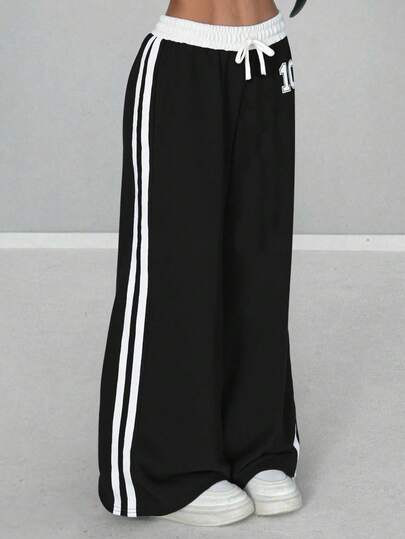 SHEIN Tween Girls färgblocksbyxor med numeriskt tryck, lösa casualbyxor, mångsidiga för vardagsbruk och utflykter