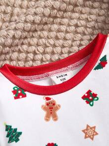 SHEIN Conjunto de pijama de 2 piezas con parte superior con gráfico navideño y pantalón pitillo para niños pequeños, con estampado de renos y copos de nieve, adecuado para Navidad - Rojo y blanco - Ver 4