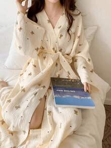 SHEIN Áo choàng/kimono in hình gấu bông, màu trơn nhẹ, kiểu dáng tối giản châu Âu, tay dài, cổ chữ V, có túi, đồ ngủ mặc nhà thoải mái cho nữ, áo choàng tắm, trang trí nhà cửa mùa xuân thu hè, đám cưới, trở lại trường học. - Màu be - Xem 8