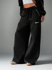 MISSGUIDED Quần thể thao ống rộng có chi tiết lỗ xỏ dây, cạp chun rút, thích hợp mặc ở nhà và dạo phố - màu đen - Xem 5